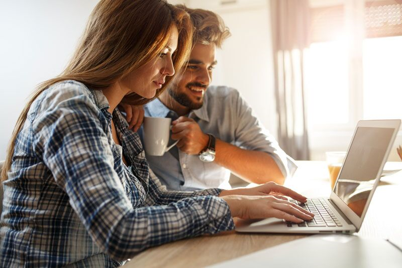 couple looking at online reviews